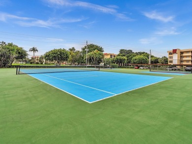 Welcome home to this updated first floor 2 BR/2 BA condo with on Boca Dunes Golf and Country Club in Florida - for sale on GolfHomes.com, golf home, golf lot