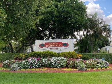 Welcome home to this updated first floor 2 BR/2 BA condo with on Boca Dunes Golf and Country Club in Florida - for sale on GolfHomes.com, golf home, golf lot
