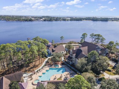 Nestled within the gated Wild Heron neighborhood, this home on Sharks Tooth Golf Club in Florida - for sale on GolfHomes.com, golf home, golf lot