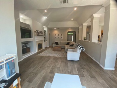 This single-story home, situated in a cul-de-sac, features three on The Golf Club at Fossil Creek in Texas - for sale on GolfHomes.com, golf home, golf lot
