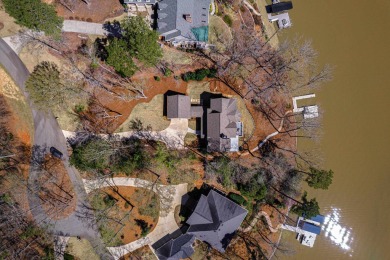 Welcome to 1050 Bartrams Bluff, a lakefront home in Reynolds on Reynolds Lake Oconee - The Oconee in Georgia - for sale on GolfHomes.com, golf home, golf lot