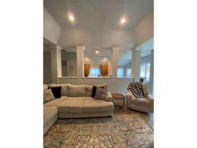 This single-story home, situated in a cul-de-sac, features three on The Golf Club at Fossil Creek in Texas - for sale on GolfHomes.com, golf home, golf lot