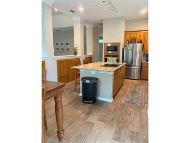 This single-story home, situated in a cul-de-sac, features three on The Golf Club at Fossil Creek in Texas - for sale on GolfHomes.com, golf home, golf lot