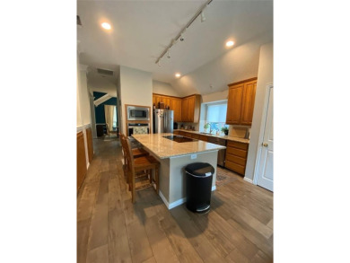This single-story home, situated in a cul-de-sac, features three on The Golf Club at Fossil Creek in Texas - for sale on GolfHomes.com, golf home, golf lot
