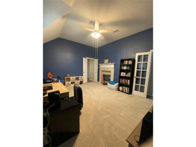 This single-story home, situated in a cul-de-sac, features three on The Golf Club at Fossil Creek in Texas - for sale on GolfHomes.com, golf home, golf lot