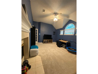 This single-story home, situated in a cul-de-sac, features three on The Golf Club at Fossil Creek in Texas - for sale on GolfHomes.com, golf home, golf lot