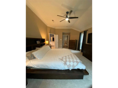 This single-story home, situated in a cul-de-sac, features three on The Golf Club at Fossil Creek in Texas - for sale on GolfHomes.com, golf home, golf lot