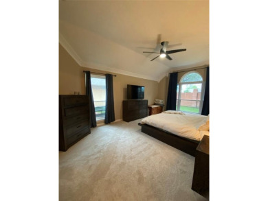 This single-story home, situated in a cul-de-sac, features three on The Golf Club at Fossil Creek in Texas - for sale on GolfHomes.com, golf home, golf lot