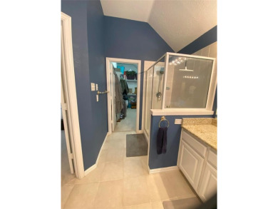 This single-story home, situated in a cul-de-sac, features three on The Golf Club at Fossil Creek in Texas - for sale on GolfHomes.com, golf home, golf lot