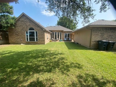 This single-story home, situated in a cul-de-sac, features three on The Golf Club at Fossil Creek in Texas - for sale on GolfHomes.com, golf home, golf lot