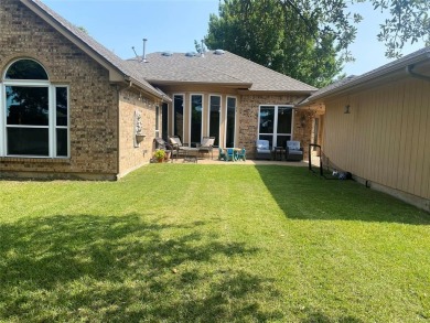 This single-story home, situated in a cul-de-sac, features three on The Golf Club at Fossil Creek in Texas - for sale on GolfHomes.com, golf home, golf lot