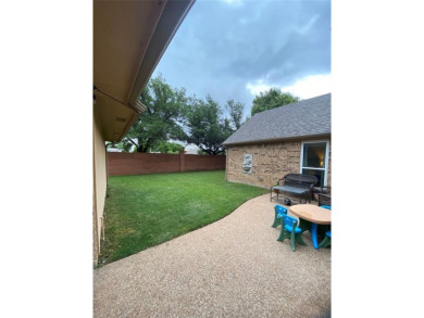 This single-story home, situated in a cul-de-sac, features three on The Golf Club at Fossil Creek in Texas - for sale on GolfHomes.com, golf home, golf lot