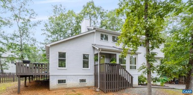 Step inside this spacious, contemporary home filled with soaring on Lake Monticello Golf Course in Virginia - for sale on GolfHomes.com, golf home, golf lot