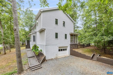Step inside this spacious, contemporary home filled with soaring on Lake Monticello Golf Course in Virginia - for sale on GolfHomes.com, golf home, golf lot