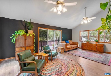 Step inside this spacious, contemporary home filled with soaring on Lake Monticello Golf Course in Virginia - for sale on GolfHomes.com, golf home, golf lot