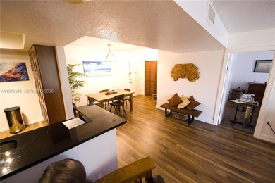 WHY RENT WHEN YOU CAN OWN THIS 2/2 CONDO WITH ALMOST 1,100 SQ on Woodlands Country Club in Florida - for sale on GolfHomes.com, golf home, golf lot