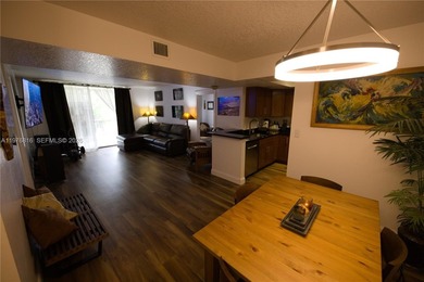 WHY RENT WHEN YOU CAN OWN THIS 2/2 CONDO WITH ALMOST 1,100 SQ on Woodlands Country Club in Florida - for sale on GolfHomes.com, golf home, golf lot