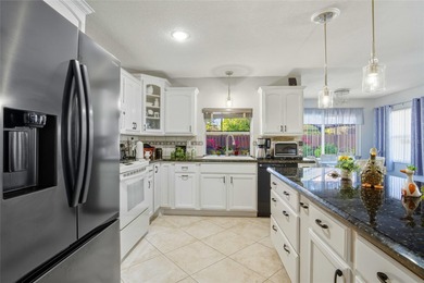 Welcome to this stunning 4-bedroom, 2-bath completely remodeled on Orange Tree Golf Club in Florida - for sale on GolfHomes.com, golf home, golf lot