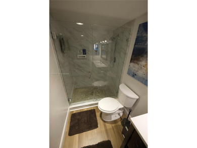 WHY RENT WHEN YOU CAN OWN THIS 2/2 CONDO WITH ALMOST 1,100 SQ on Woodlands Country Club in Florida - for sale on GolfHomes.com, golf home, golf lot