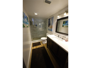 WHY RENT WHEN YOU CAN OWN THIS 2/2 CONDO WITH ALMOST 1,100 SQ on Woodlands Country Club in Florida - for sale on GolfHomes.com, golf home, golf lot