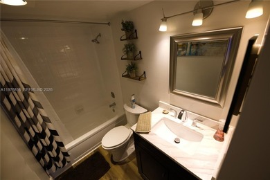 WHY RENT WHEN YOU CAN OWN THIS 2/2 CONDO WITH ALMOST 1,100 SQ on Woodlands Country Club in Florida - for sale on GolfHomes.com, golf home, golf lot