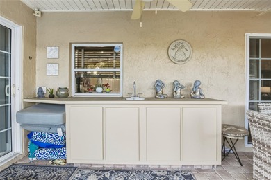 Welcome to this stunning 4-bedroom, 2-bath completely remodeled on Orange Tree Golf Club in Florida - for sale on GolfHomes.com, golf home, golf lot