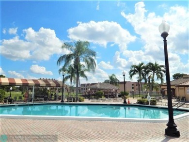 Remarkable 55+ Community, Sunrise Lakes Phase 3, offers a fully on Sunrise Lakes Phase III in Florida - for sale on GolfHomes.com, golf home, golf lot