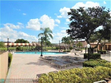 Remarkable 55+ Community, Sunrise Lakes Phase 3, offers a fully on Sunrise Lakes Phase III in Florida - for sale on GolfHomes.com, golf home, golf lot