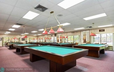 Remarkable 55+ Community, Sunrise Lakes Phase 3, offers a fully on Sunrise Lakes Phase III in Florida - for sale on GolfHomes.com, golf home, golf lot