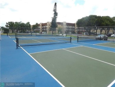 Remarkable 55+ Community, Sunrise Lakes Phase 3, offers a fully on Sunrise Lakes Phase III in Florida - for sale on GolfHomes.com, golf home, golf lot