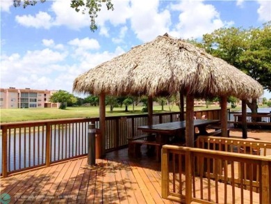 Remarkable 55+ Community, Sunrise Lakes Phase 3, offers a fully on Sunrise Lakes Phase III in Florida - for sale on GolfHomes.com, golf home, golf lot