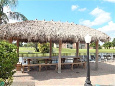 Remarkable 55+ Community, Sunrise Lakes Phase 3, offers a fully on Sunrise Lakes Phase III in Florida - for sale on GolfHomes.com, golf home, golf lot