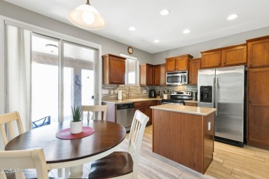 ARIZONA LIVING MADE EASY!! This charming home comes fully on Poston Butte Golf Club in Arizona - for sale on GolfHomes.com, golf home, golf lot