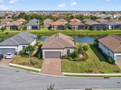 Experience modern luxury and effortless sophistication in this on Esplanade Golf and Country at Lakewood Ranch in Florida - for sale on GolfHomes.com, golf home, golf lot