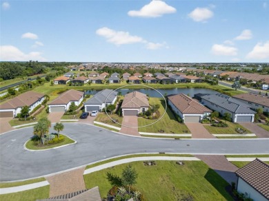 Experience modern luxury and effortless sophistication in this on Esplanade Golf and Country at Lakewood Ranch in Florida - for sale on GolfHomes.com, golf home, golf lot