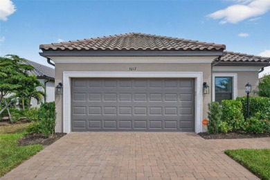 Experience modern luxury and effortless sophistication in this on Esplanade Golf and Country at Lakewood Ranch in Florida - for sale on GolfHomes.com, golf home, golf lot