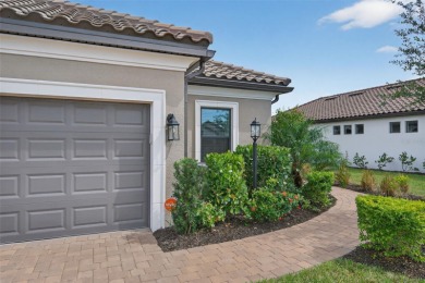 Experience modern luxury and effortless sophistication in this on Esplanade Golf and Country at Lakewood Ranch in Florida - for sale on GolfHomes.com, golf home, golf lot