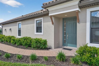 Experience modern luxury and effortless sophistication in this on Esplanade Golf and Country at Lakewood Ranch in Florida - for sale on GolfHomes.com, golf home, golf lot