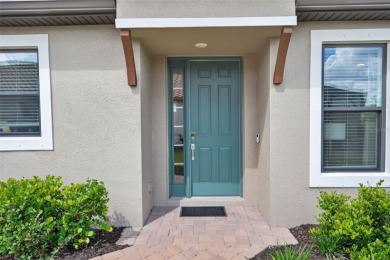 Experience modern luxury and effortless sophistication in this on Esplanade Golf and Country at Lakewood Ranch in Florida - for sale on GolfHomes.com, golf home, golf lot