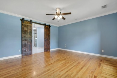 Welcome to this stunning 5-bedroom, 4.5-bathroom completely on Golden Eagle Country Club in Florida - for sale on GolfHomes.com, golf home, golf lot