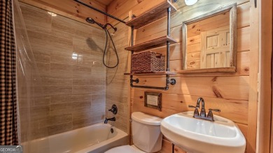 This stunning, like-new 3 Bed/3 Bath mountain retreat offers on White Path Golf Club in Georgia - for sale on GolfHomes.com, golf home, golf lot