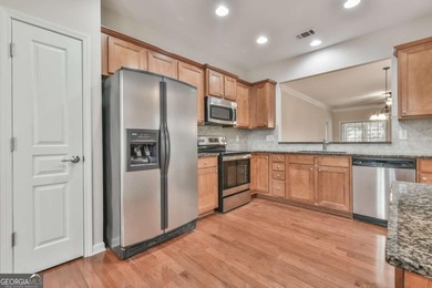 WHAT IS SPECIAL ABOUT THIS HOME? This Gray Myst is move-in ready on Reunion Golf Club in Georgia - for sale on GolfHomes.com, golf home, golf lot