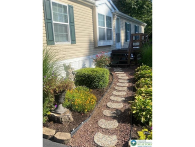 Well maintained home situated on a desirable lot in Melody Lakes on  in Pennsylvania - for sale on GolfHomes.com, golf home, golf lot