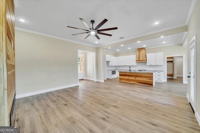 Beautiful 4 bedroom, 2 bath home located in a quiet neighborhood on Southern Hills Golf Club in Georgia - for sale on GolfHomes.com, golf home, golf lot