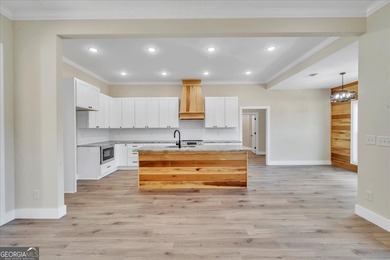 Beautiful 4 bedroom, 2 bath home located in a quiet neighborhood on Southern Hills Golf Club in Georgia - for sale on GolfHomes.com, golf home, golf lot