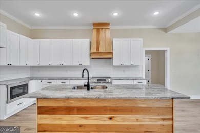 Beautiful 4 bedroom, 2 bath home located in a quiet neighborhood on Southern Hills Golf Club in Georgia - for sale on GolfHomes.com, golf home, golf lot