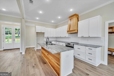 Beautiful 4 bedroom, 2 bath home located in a quiet neighborhood on Southern Hills Golf Club in Georgia - for sale on GolfHomes.com, golf home, golf lot