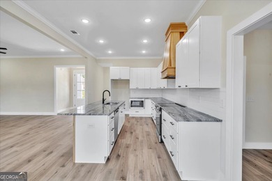 Beautiful 4 bedroom, 2 bath home located in a quiet neighborhood on Southern Hills Golf Club in Georgia - for sale on GolfHomes.com, golf home, golf lot