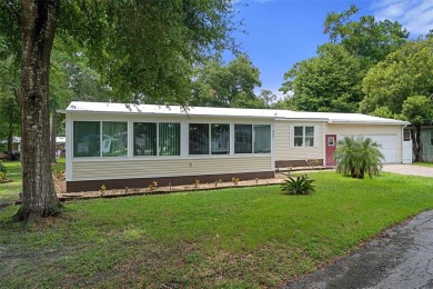 Charming 3-bedroom, 2-bathroom home, perfectly situated on a on Rivard Golf and Country Club in Florida - for sale on GolfHomes.com, golf home, golf lot