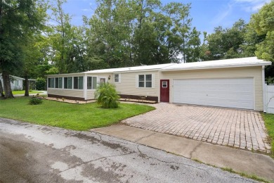 Charming 3-bedroom, 2-bathroom home, perfectly situated on a on Rivard Golf and Country Club in Florida - for sale on GolfHomes.com, golf home, golf lot